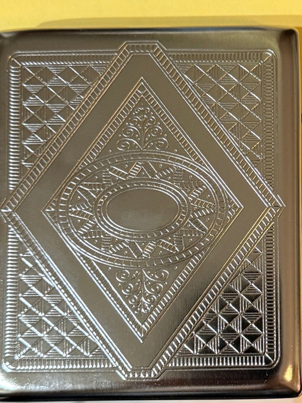 Embossed Metal Case - Ornate Silver Design